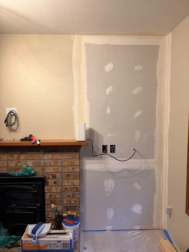 New drywall patched and taped in the alcove